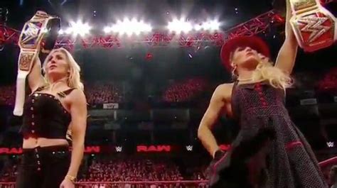 Watch Charlotte Flair And Lacey Evans Slam Becky Lynch Through A Table On Wwe Raw