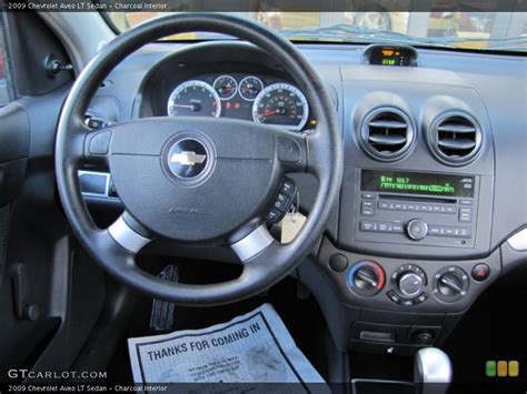 Charcoal Interior Dashboard for the 2009 Chevrolet Aveo LT Sedan #59636940 | GTCarLot.com