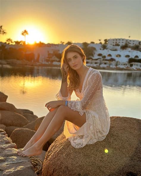 White See Through Dress On The Beach Rocks R Chiara Stile