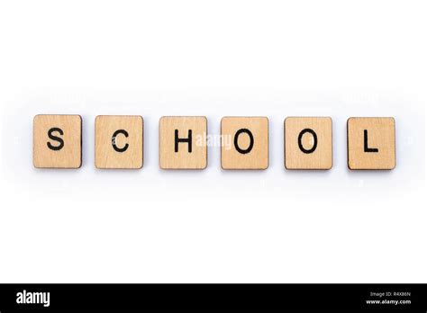 The Word School Spelt With Wooden Letter Tiles Stock Photo Alamy