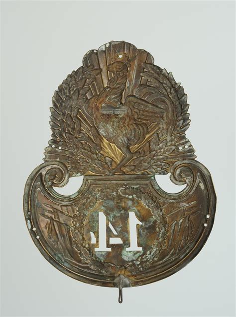 PLAQUE DE SHAKO DU 14ème RÉGIMENT D INFANTERIE MODÈLE 1831 MONARCHIE