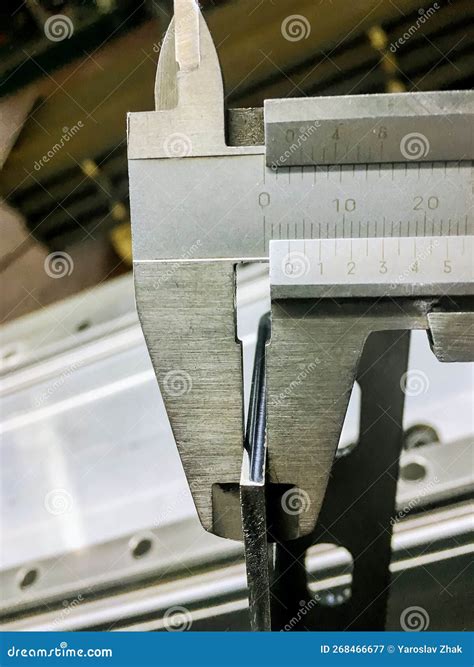 Measuring the Thickness of Sheet Metal with a Caliper. Measurement ...