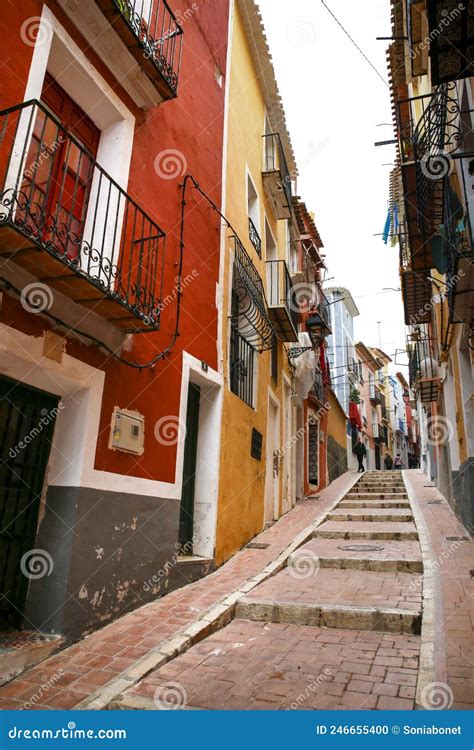 Narrow Cobbled Street And Colorful Facades In Villajoyosa Town