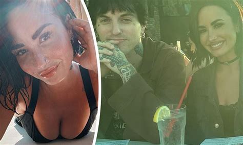 Demi Lovato Puts On A Busty Display In A Swimsuit And Poses With