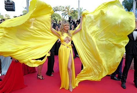 Heidi Klum Commands Attention In Clear Heels And Cutout Dress At Cannes