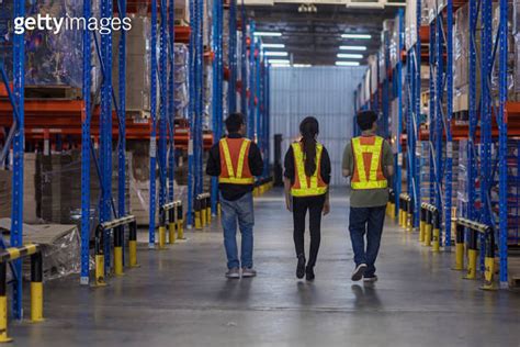 Warehouse Worker Working In Warehouse Storage Foreman Or Worker Work