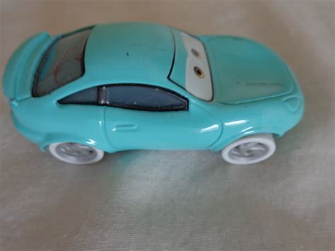 Aqua Disney Pixar Car #2679 EAB (#2708/10) and 19 similar items