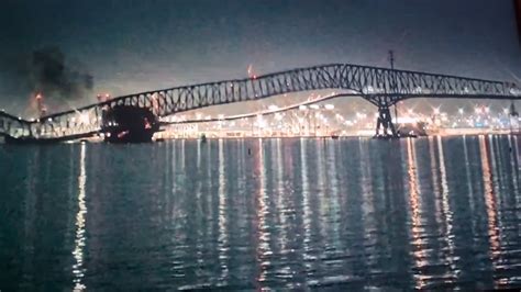 Baltimore Bridge Collapses After Being Hit By Cargo Ship As Vehicles Sent Into Water And