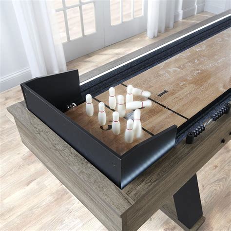 The 9' Illuminated Shuffleboard Table - Hammacher Schlemmer