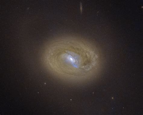 Black Hole Pair Embedded In Middle Of Active Galaxy MCG 03 34 064