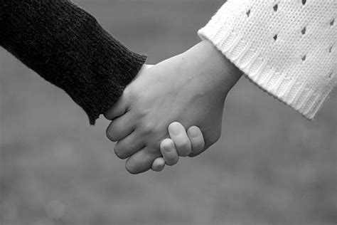 Black And White Holding Hands Stock Photos Pictures And Royalty Free