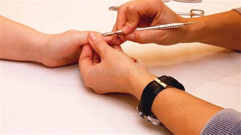 Manicure Painting And Polishing Nails In Spa Salon Stock Photo Image