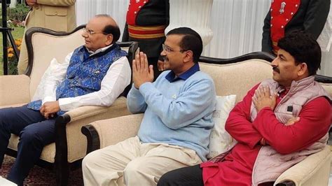 Delhi Cm Arvind Kejriwal Smiling Lg Vk Saxena With Folded Hands With Bjp Leader Manoj Tiwari