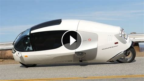 The Futuristic Monotracer Enclosed Motorcycle Half Car Half Bike