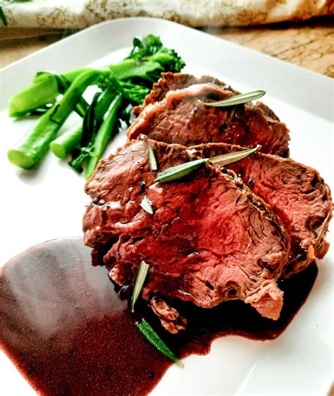 Rosemary Crusted Beef Tenderloin With Port Wine Sauce Out West Food And Lifestyle