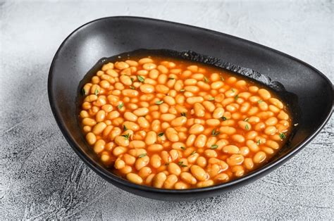 Premium Photo Baked Beans In Tomato Sauce In A Plate