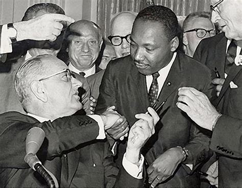 President Lyndon Johnson Shaking The Hand Of Civil Rights Leader Martin