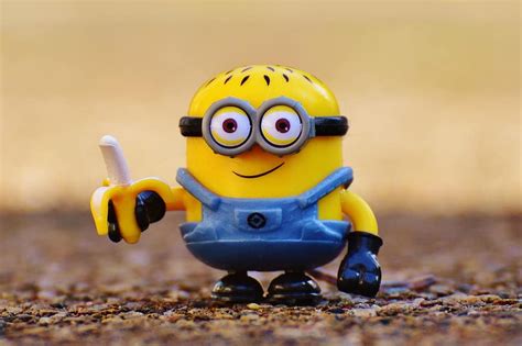 Minion Funny Toys Children Figure Yellow Cute Eat Banana Fruit