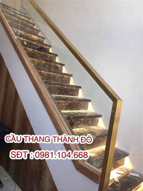 Lan Can Cầu Thang Kính Tay Vịn Inox Tuyệt Tác Kiến Trúc Hiện Đại Và