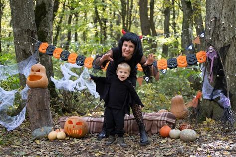 Premium Photo | Halloween. mother with little son in halloween costumes ...