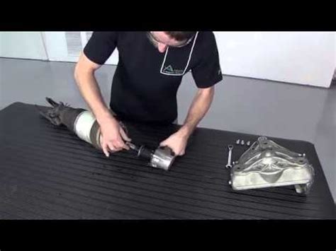 Замена переднего пневмобаллона Porsche Cayenne, VW Touareg, Audi Q7 ...