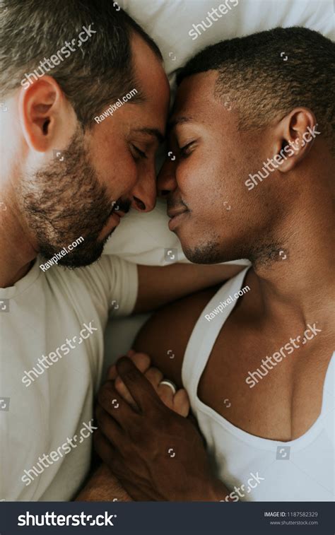 Gay Couple Cuddling Bed Stock Photo 1187582329 Shutterstock