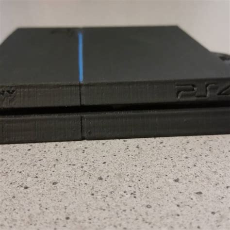 3d Printable Min Ps4 Keychain By Garrett Kearney