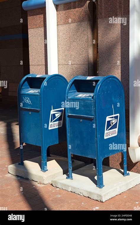 A Pair Of Usps United States Postal Service Mail Collection Boxes In