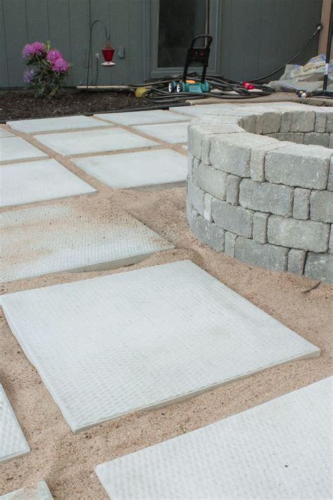 Diy Patio With Grass Between Pavers And A Fire Pit Pavers Diy Pavers Backyard Cement Patio