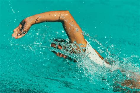 Premium Photo | Female swimmer on training in the swimming pool front crawl swimming style