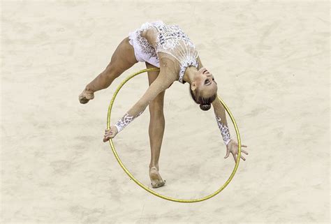 Here Are 8 Bizarre Yet Beautiful Photos Of Womens Rhythmic Gymnastics