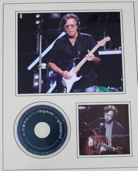 Eric Clapton Autographed Framed Display Signed In Red Pen Upon A Photograph Of Eric Clapton