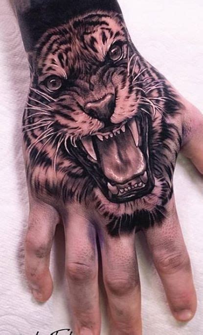 Hand Tattoos For Men Tiger Hand Tattoo Hand Tattoo Images Lion Hand