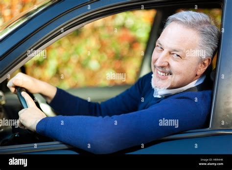 Mature Man Driving His Car Stock Photo Alamy
