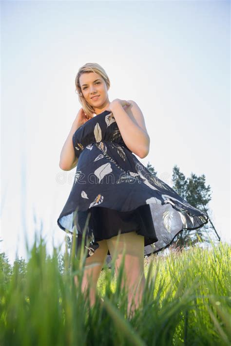 Pretty Blonde In Sundress Smiling At Camera Stock Photo Image Of