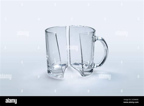 Broken Glass Cup In Half On White Background Stock Photo Alamy