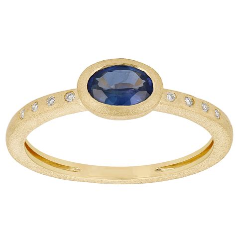 Oval Sapphire Bezel Set Ring In Matte Yellow Gold With Diamond Accents