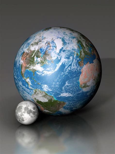 Earth And Moon Compared Photograph by Mark Garlick/science Photo ...