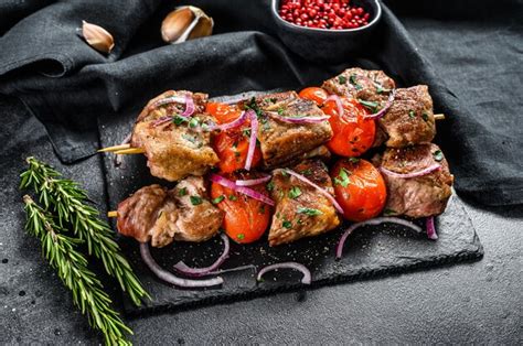 Premium Photo Shish Kebab With Onion And Tomato