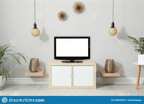 Modern Tv Set Near White Wall In Living Room Stock Photo Image Of