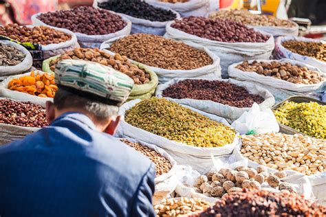 Food at local bazaar - Kashgar - China Photograph by Matteo Colombo ...