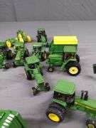 LOT OF MISC JOHN DEERE MINIATURE TRACTORS AND ATTACHMENTS EK