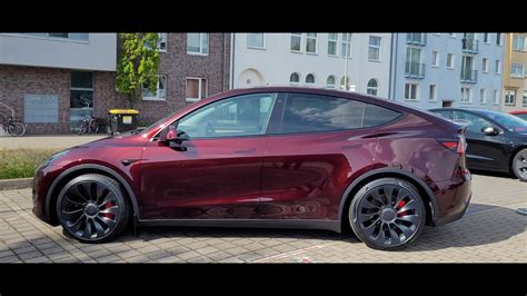 2024 Tesla Model Y Performance Ultra Red Rosie Koralle