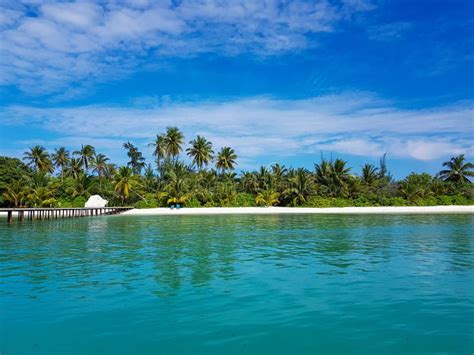 View On Resort Island From Distance Beautiful Tropical Beach Line With