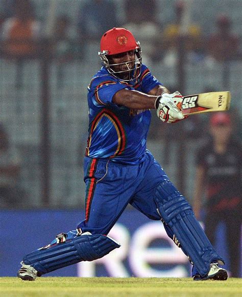 Mohammad Shahzad tries to swat one away | ESPNcricinfo.com