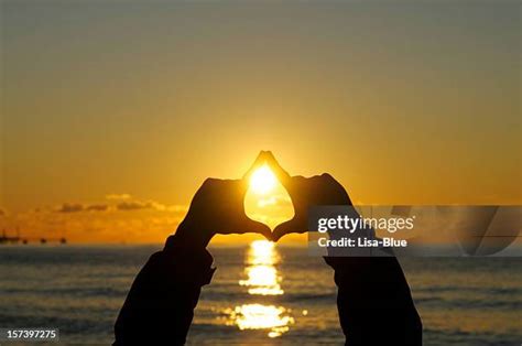 Hand Catching The Sun Photos And Premium High Res Pictures Getty Images