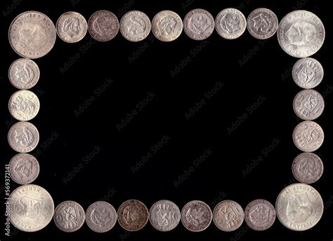 Frame Made Of Old Dutch Coins Of One Guilder And 10 Guilders With Empty