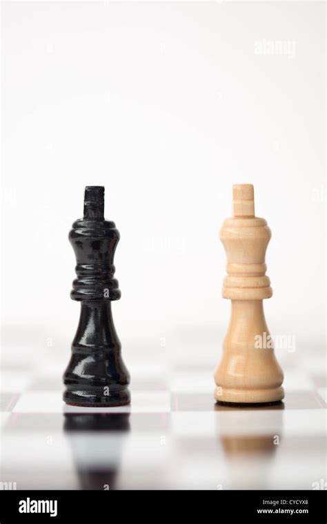 Black and white chess pieces Stock Photo - Alamy