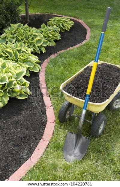 Mulch Bed Around House Wheelbarrow Along Stock Photo Edit Now 104220761