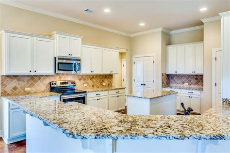 Gorgeous Kitchen With Stainless Steel Appliances Granite Countertops And Off White Custom